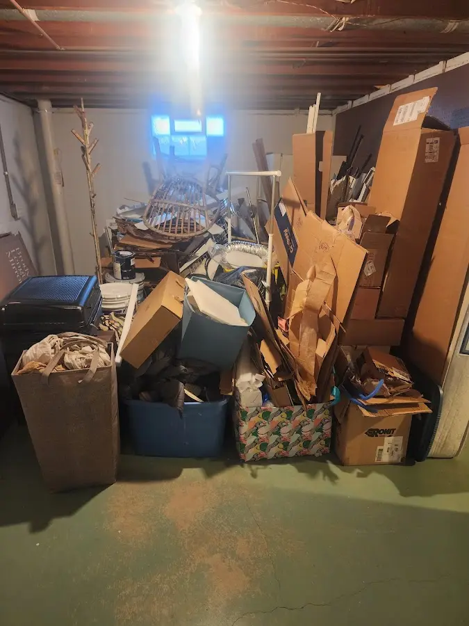 Roll-off dumpster container at job site for Roll Off Dumpster Rental in Williams